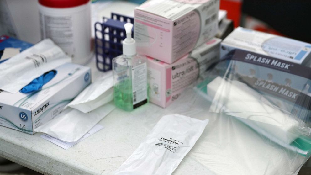 PHOTO: A coronavirus test kit is seen in its protective pouch on a table as health care staff members from the FoundCare center on March 16, 2020 in West Palm Beach, Fla.