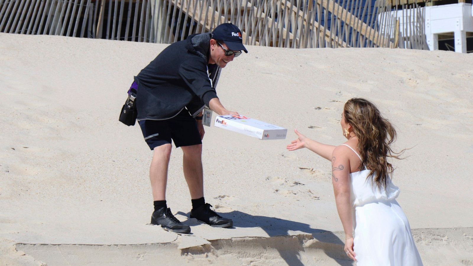 FedEx driver delivers rings just in time for couple s beach