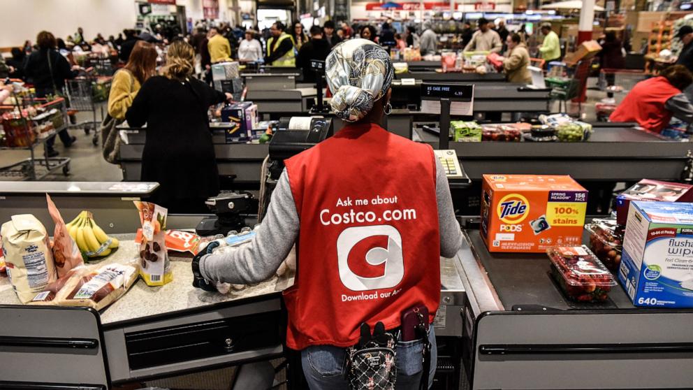 PHOTO: A worker in a check-out line is seen at a Costco store, Feb. 28, 2024, in Teterboro, N.J.