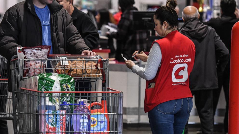 PHOTO: A worker checks a receipt at a Costco store, Feb. 28, 2024, in Teterboro, N.J.