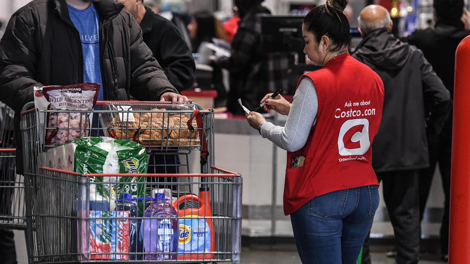 PHOTO: A worker checks a receipt at a Costco store, Feb. 28, 2024, in Teterboro, N.J.