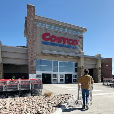 PHOTO: A shopper pushes a cart toward the entrance of a Costco warehouse, March 13, 2025, in Sheridan, Colo.