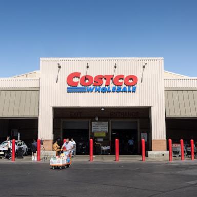 PHOTO: A man with a flat cart full of groceries leaves a Costco warehouse on April 4, 2025, in Hawthorne, California.
