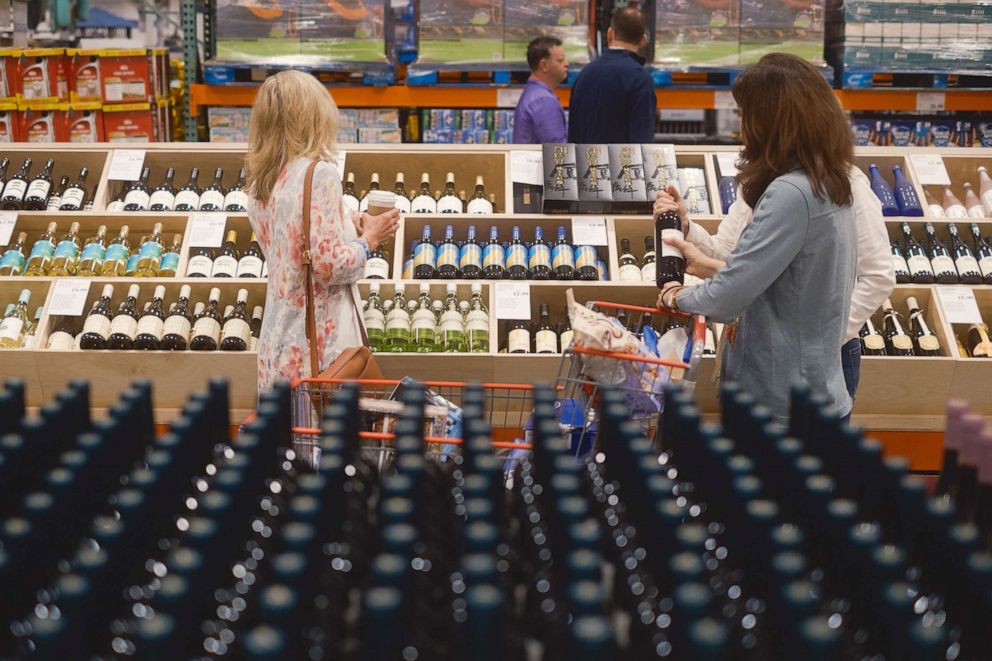 PHOTO: People shop for wine during the grand opening of a Costco Wholesale store in Kyle, Texas, March 30, 2023.