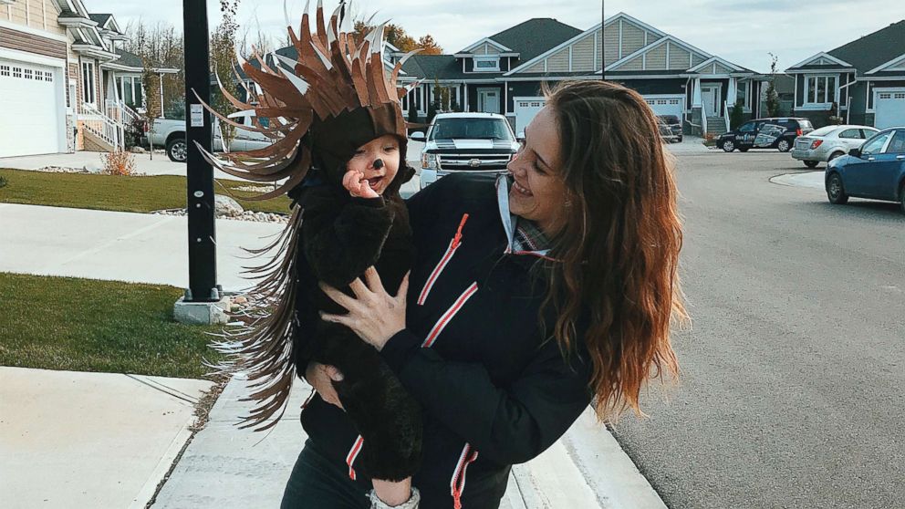 PHOTO: Danielle Bevens holds her son, dressed in a porcupine costume.