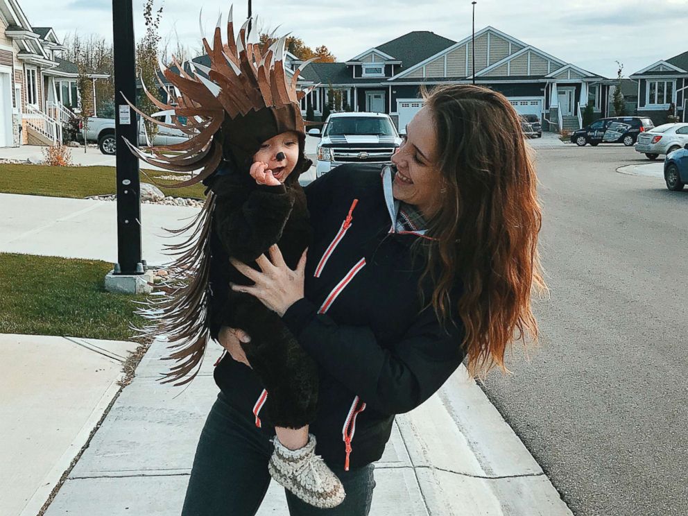 PHOTO: Danielle Bevens holds her son, dressed in a porcupine costume.