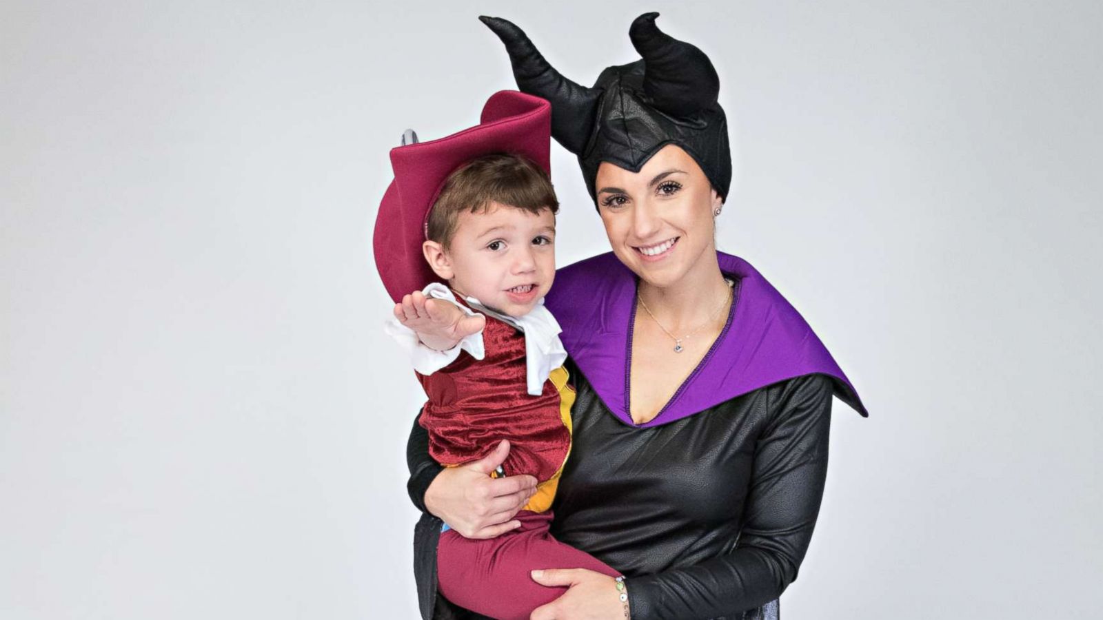 PHOTO: A mother and her son wear "Disney Villains" Halloween costumes. The mother is wearing a Maleficent costume, and her son is wearing a Captain Hook costume.