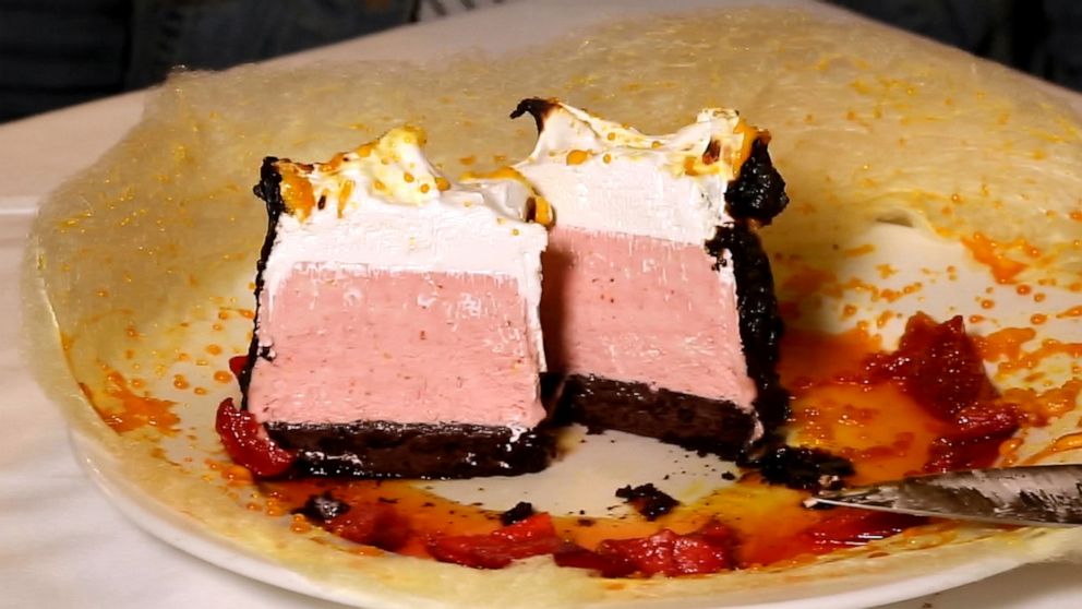 PHOTO: Inside the cotton candy baked Alaska is chocolate cake, topped with semifreddo and Swiss meringue.