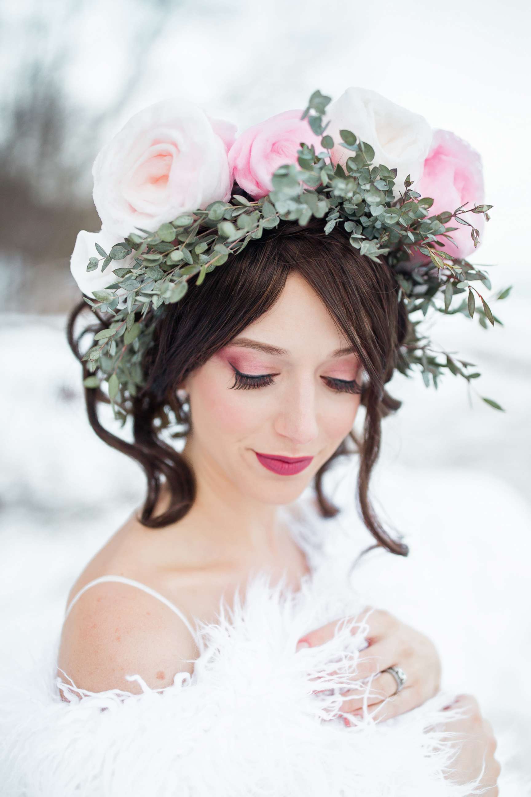 PHOTO: A model displays a flower crown crafted from cotton candy in a wedding-style photo shoot by Milwaukee-based wedding photographer Lottie Lillian.