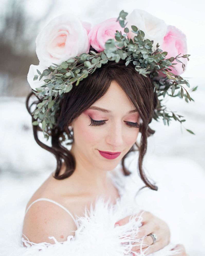 PHOTO: A model displays a flower crown crafted from cotton candy in a wedding-style photo shoot by Milwaukee-based wedding photographer Lottie Lillian.