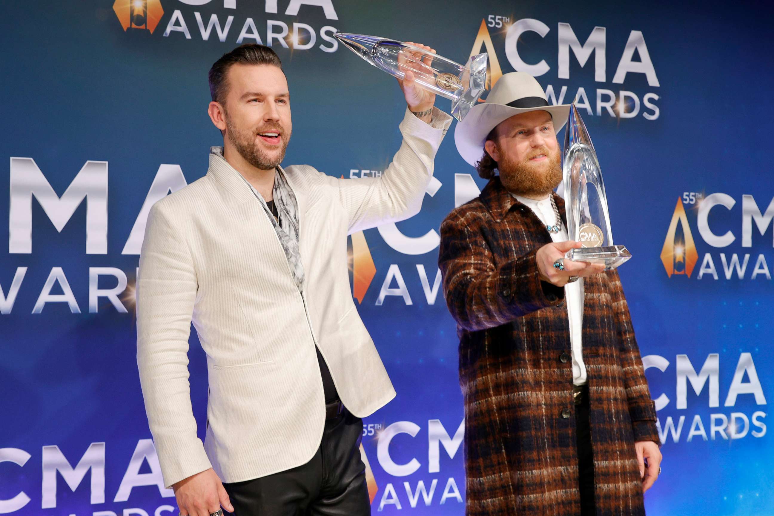 PHOTO: T.J. Osborne and John Osborne of Brothers Osborne pose with their awards for the 55th annual Country Music Association awards in Nashville, Tenn., Nov. 10. 2021.