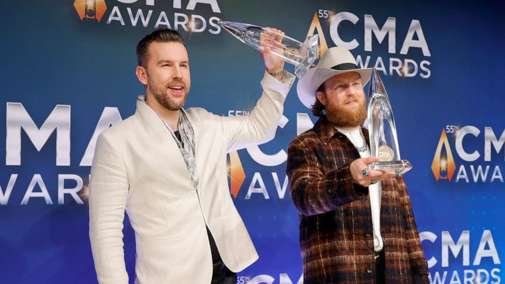 PHOTO: T.J. Osborne and John Osborne of Brothers Osborne pose with their awards for the 55th annual Country Music Association awards in Nashville, Tenn., Nov. 10. 2021.