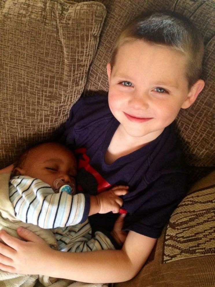 PHOTO: Scott Fessenden, 11, is seen holding his baby brother Mason.