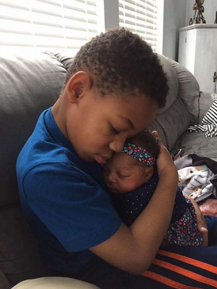 PHOTO: Milo Weight, 5, is seen in an undated photo holding his baby sister Onni, 3 months. The children share the same birth mother and were adopted into the same family.