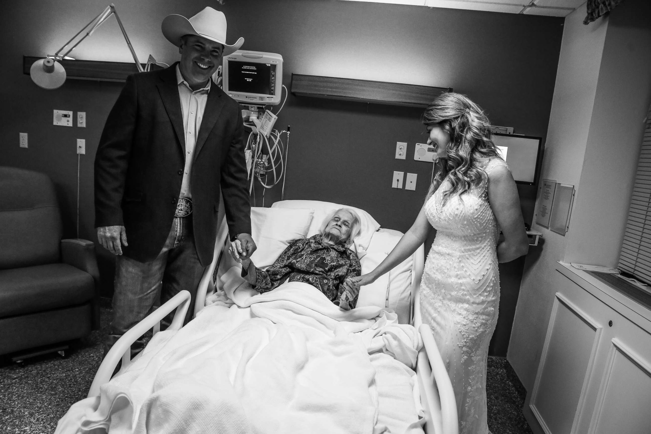 PHOTO: Clay Cameron, weds Sky Howard in an unofficial ceremony at Hemphill County Hospital in Hemphill County, Texas, beside his grandmother, harlotte Bussard, 100.