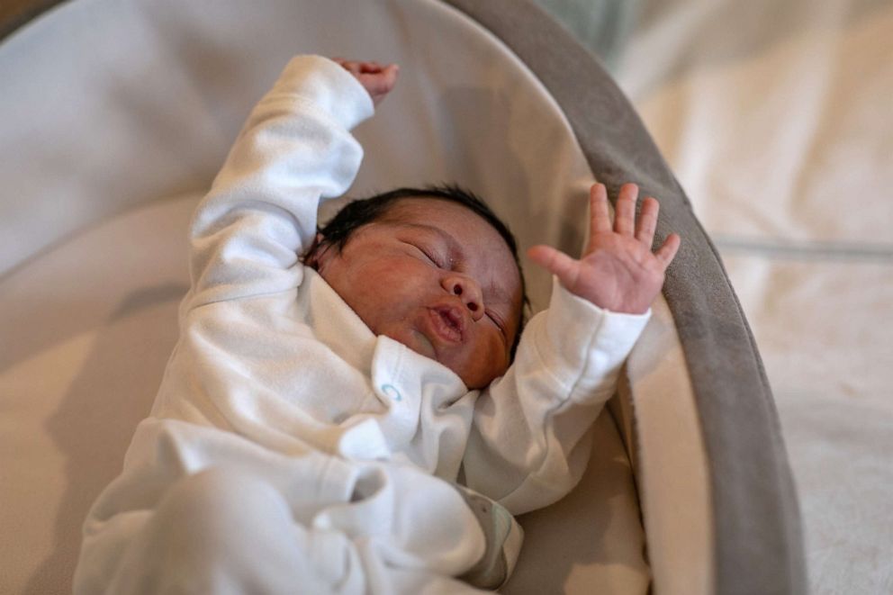 PHOTO: Baby Neysel stretches in a bassinet at Luciana Lira's home on April 20, 2020 , in Stamford, Conn.