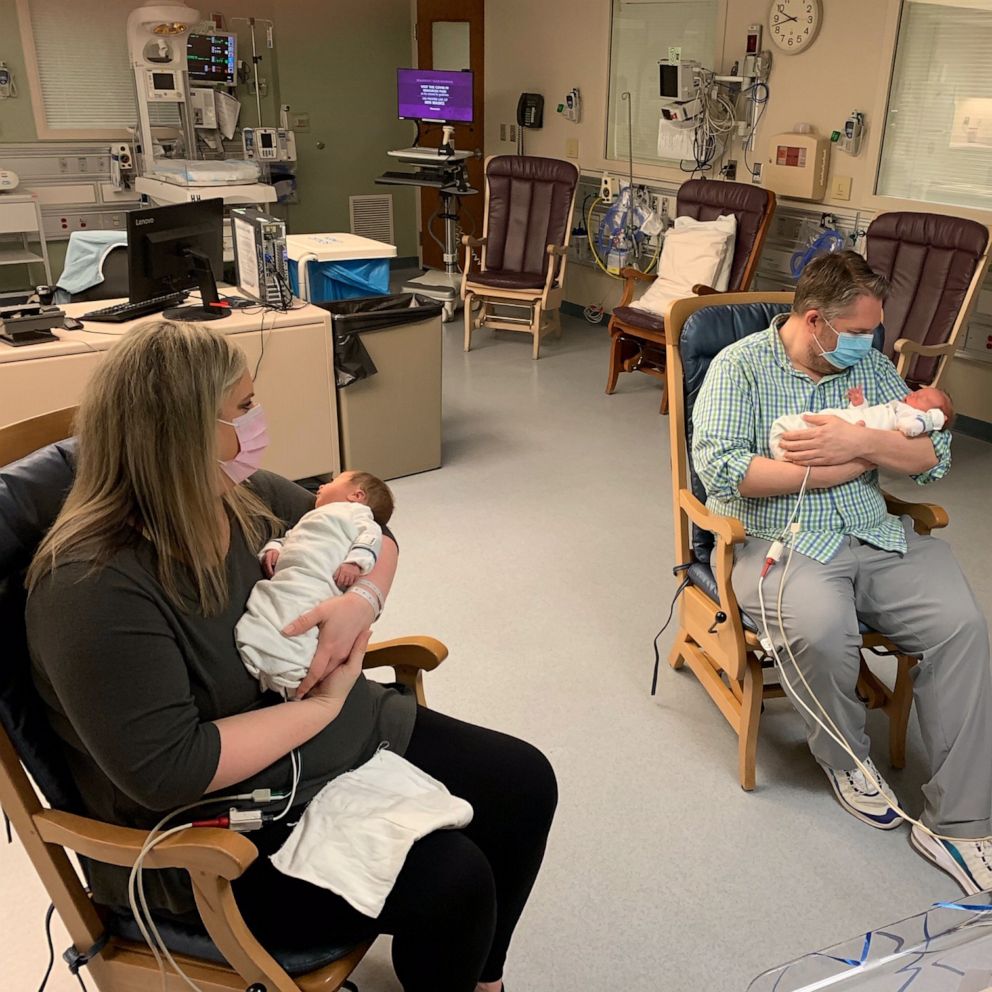 VIDEO: Mom and dad recovered from COVID-19, and finally met their 20-day-old newborn twins 