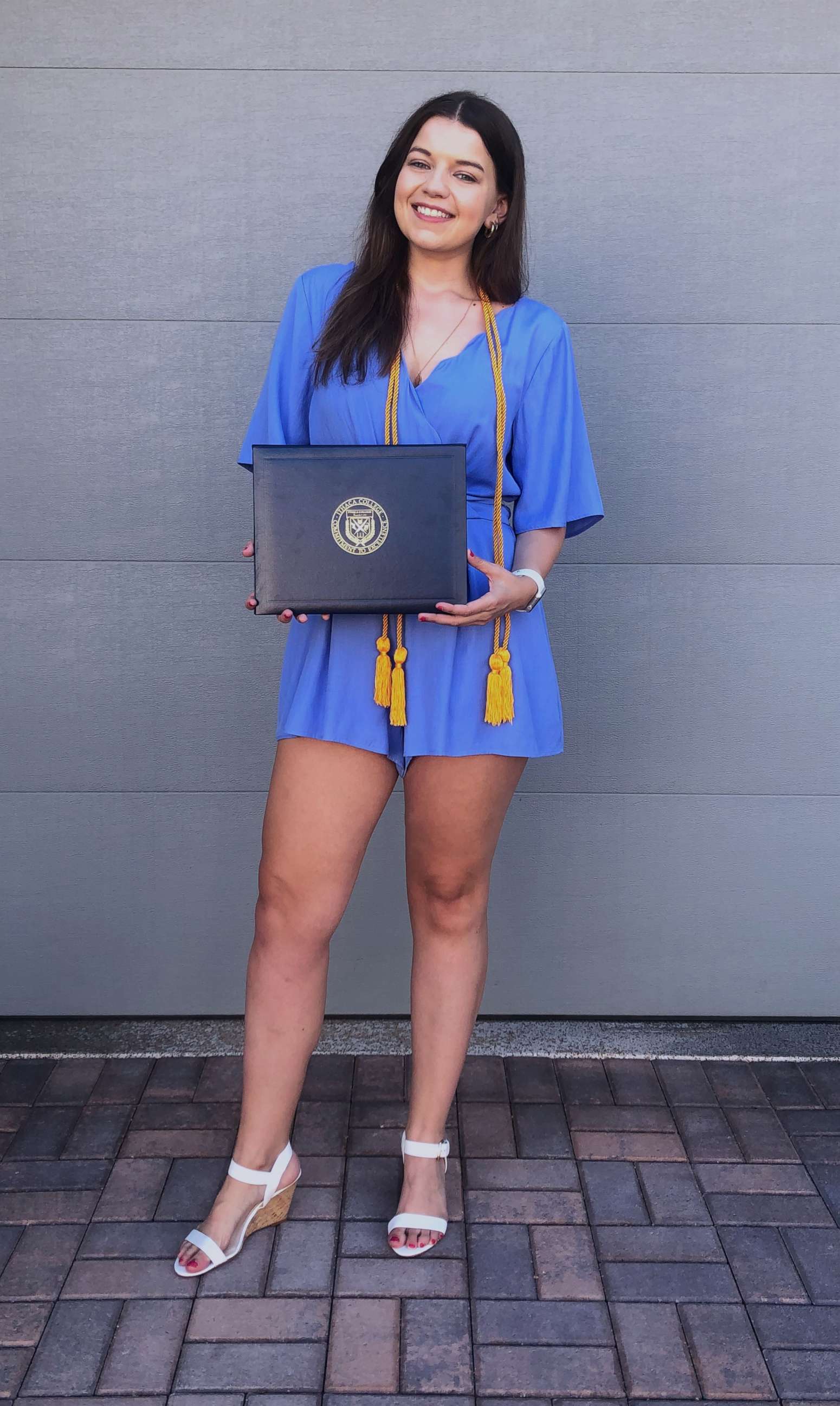 PHOTO: Marissa Ellis poses with her diploma from Ithaca College in an undated photo.