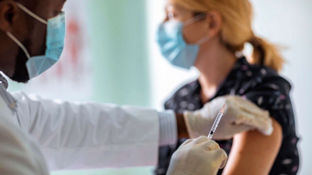 PHOTO: A young woman receives a vaccine shot in an undated stock image.