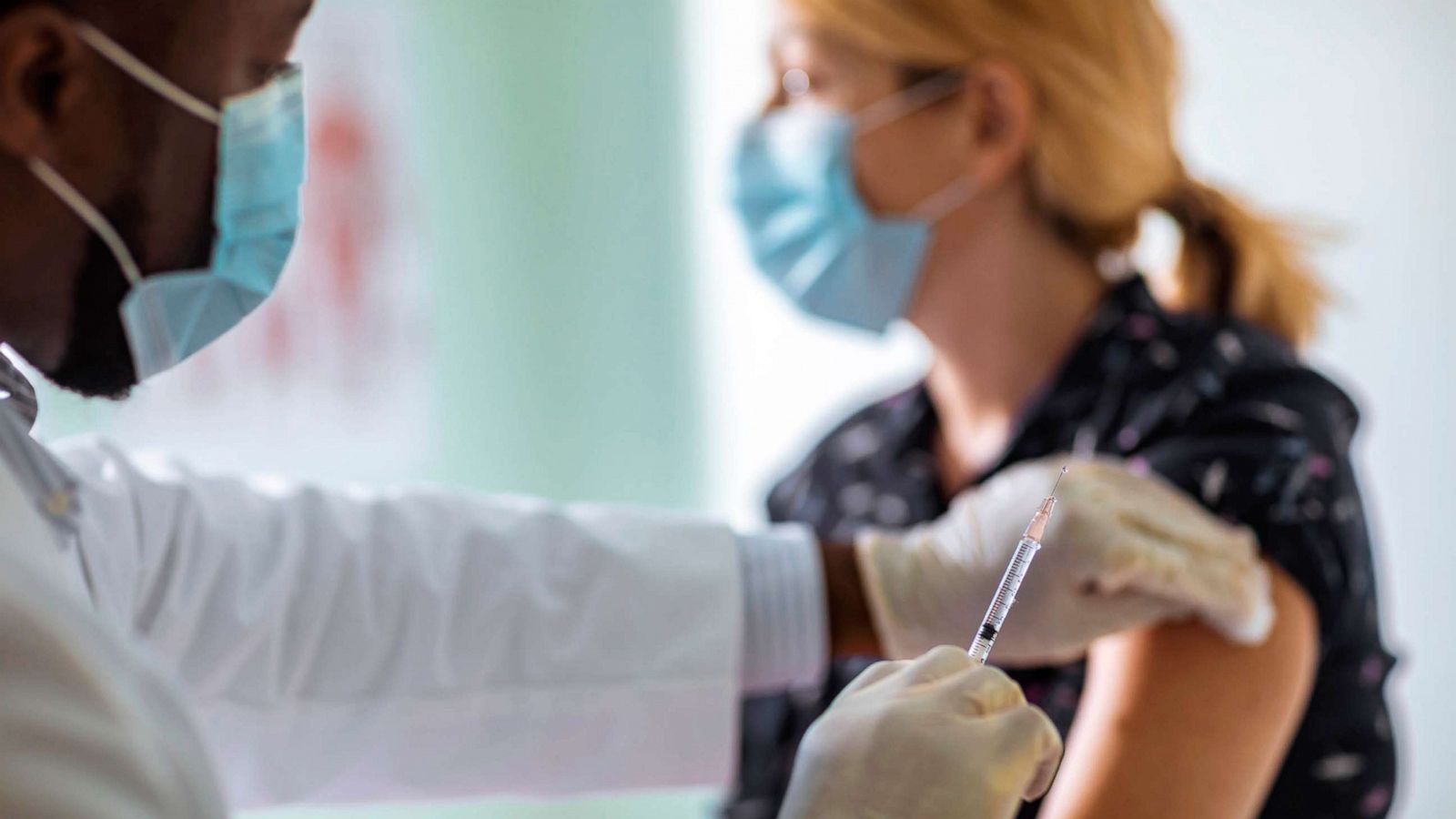 PHOTO: A young woman receives a vaccine shot in an undated stock image.