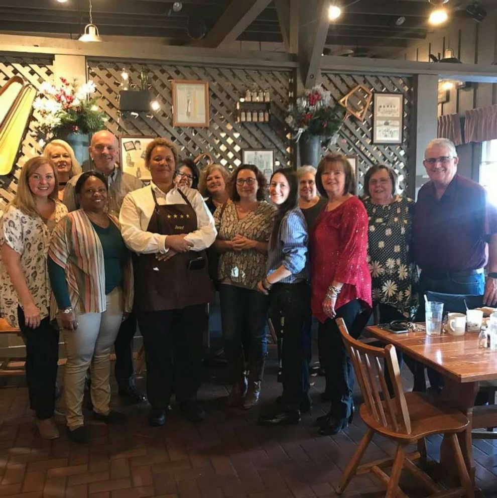 PHOTO: Janet Ballard with the group of 13 who gifted her a $1200 tip at a Cracker Barrel in Dublin, Georgia.