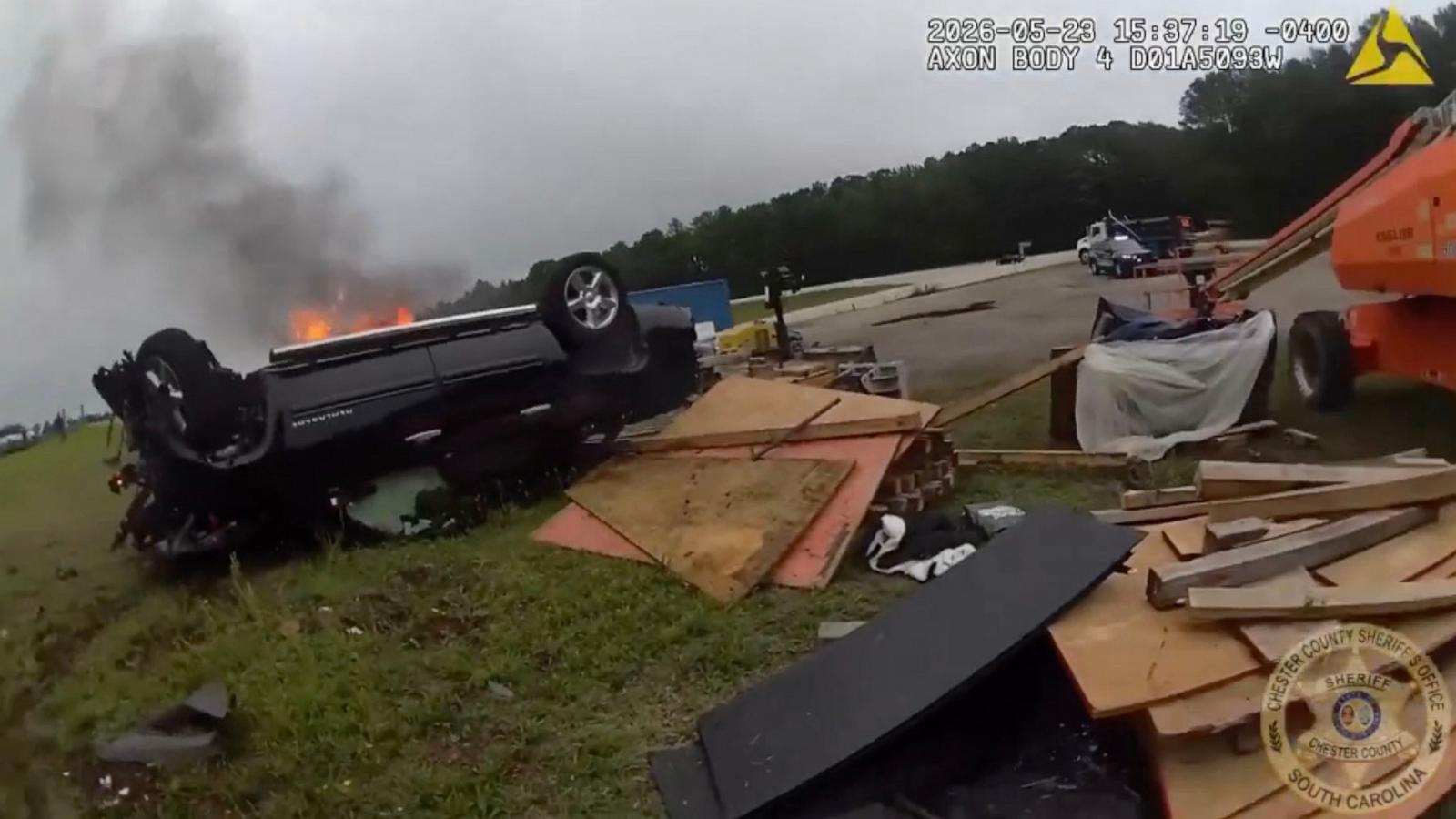 PHOTO: A Chester County Sheriff's deputy arrives on the scene of a burning car, May 23, 2026.