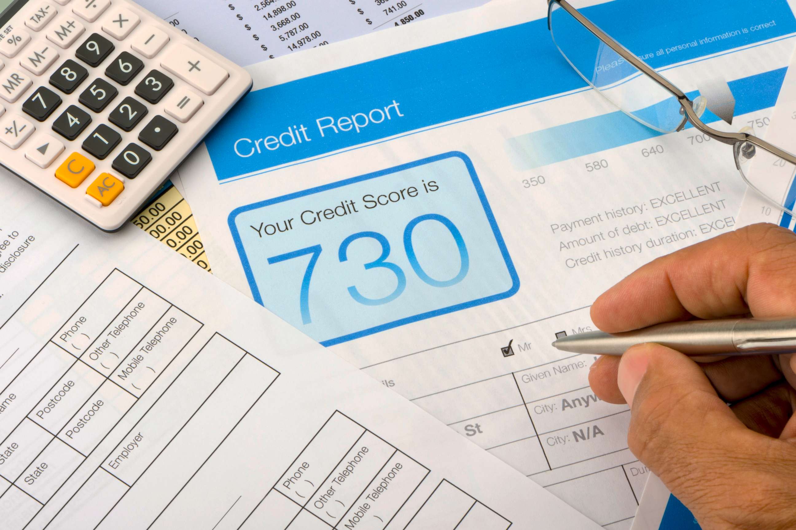 PHOTO: In this undated stock photo, a credit report form on a desk with other paperwork.