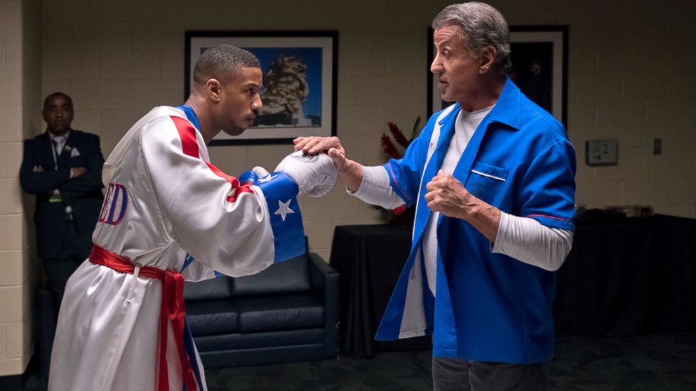 Michael B. Jordan, left, and Sylvester Stallone in a scene from "Creed II."