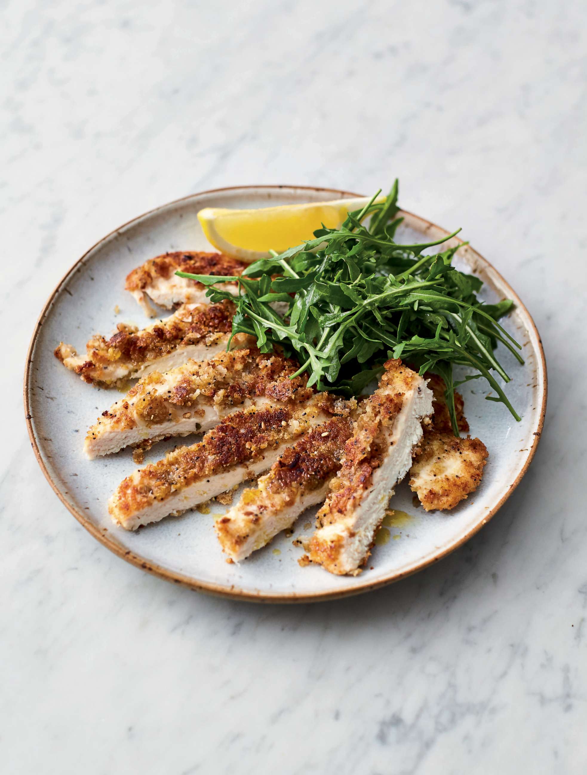PHOTO: Jamie Oliver's crispy garlicky chicken from his new cookbook "5 Ingredients Quick & Easy Food."