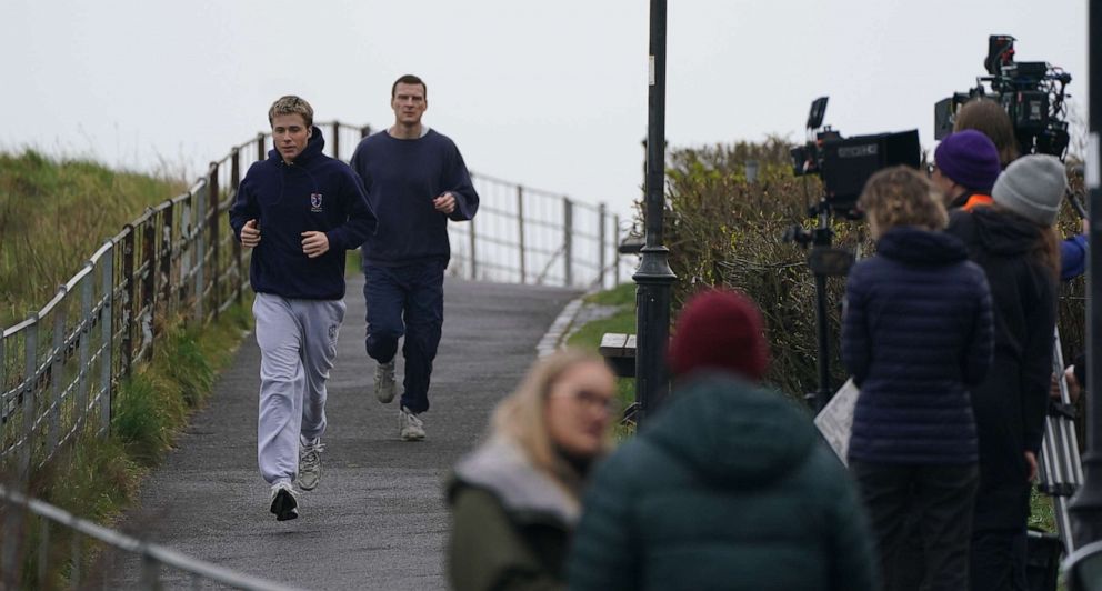 PHOTO: Actor Ed McVey, who plays the part of Prince William, films a scene at East Scores in St. Andrews, Scotland, for the next season of The Crown, March 16, 2023.