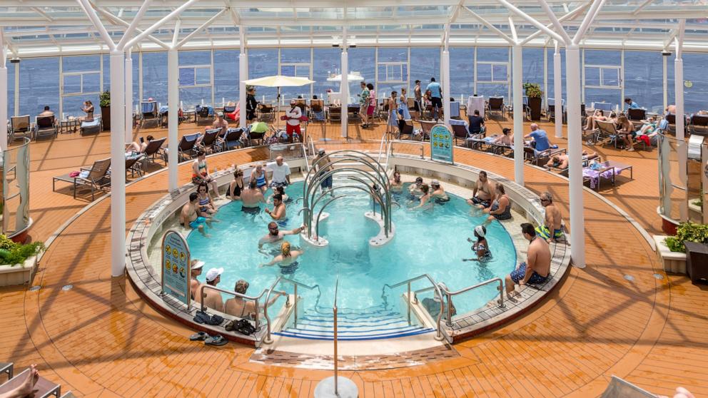 PHOTO: Passengers enjoying the pool at the Solarium on the Royal Caribbean Allure of the Seas cruise ship. 