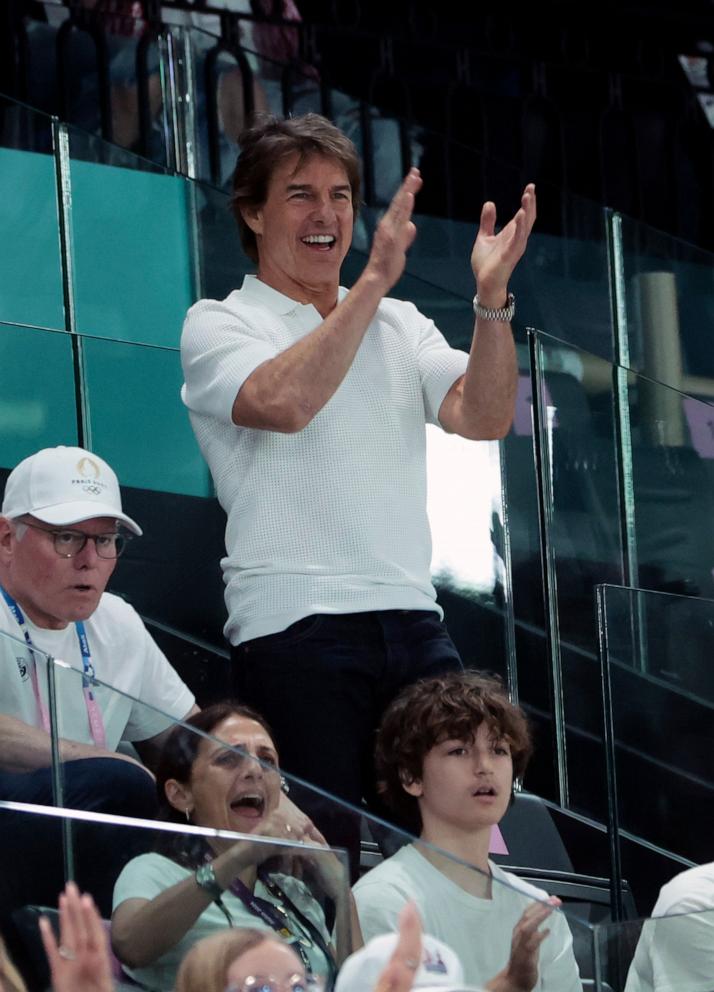 PHOTO: Tom Cruise attends day two of the Paris 2024 Olympic Games at the artistic gymnastics event with Simone Biles of USA at Paris Arena on July 28, 2024 in Paris.