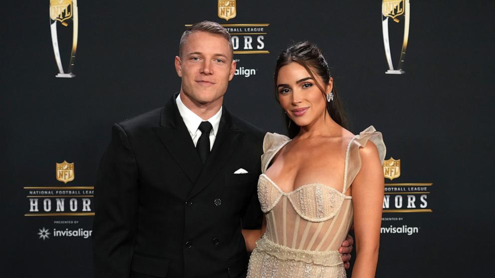 PHOTO: Christian McCaffrey and Olivia Culpo attend the 12th Annual NFL Honors at Symphony Hall on February 09, 2023 in Phoenix, Arizona.