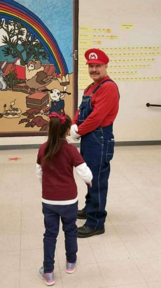 PHOTO: Custodian David Howard retires from Johnson Primary School after dressing up as Mario for years.
