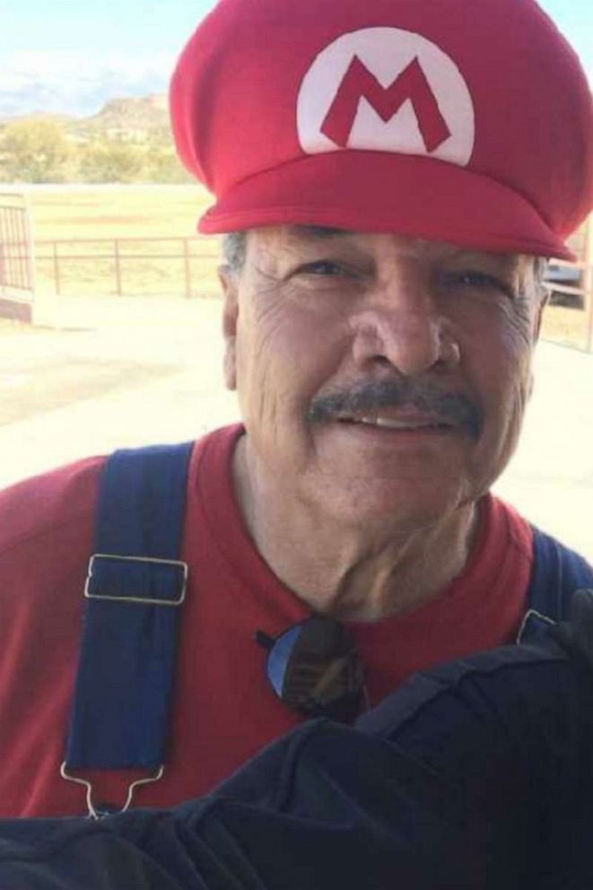 PHOTO: Custodian David Howard retires from Johnson Primary School after dressing up as Mario for years.