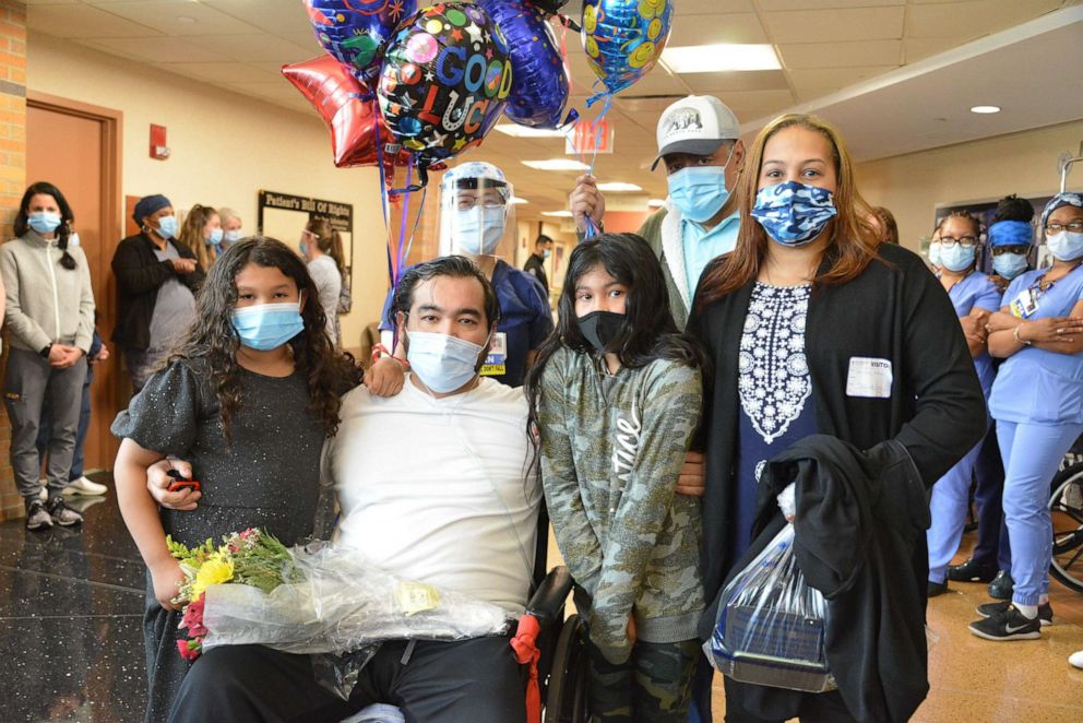 PHOTO: Alfredo Hercules was hospitalized at Catholic Health’s Mercy Hospital in Rockville Centre, New York with COVID-19. On March 24, the 39-year-old was discharged and was able to hug his daughters Isabel, 9 and Safiah, 7.