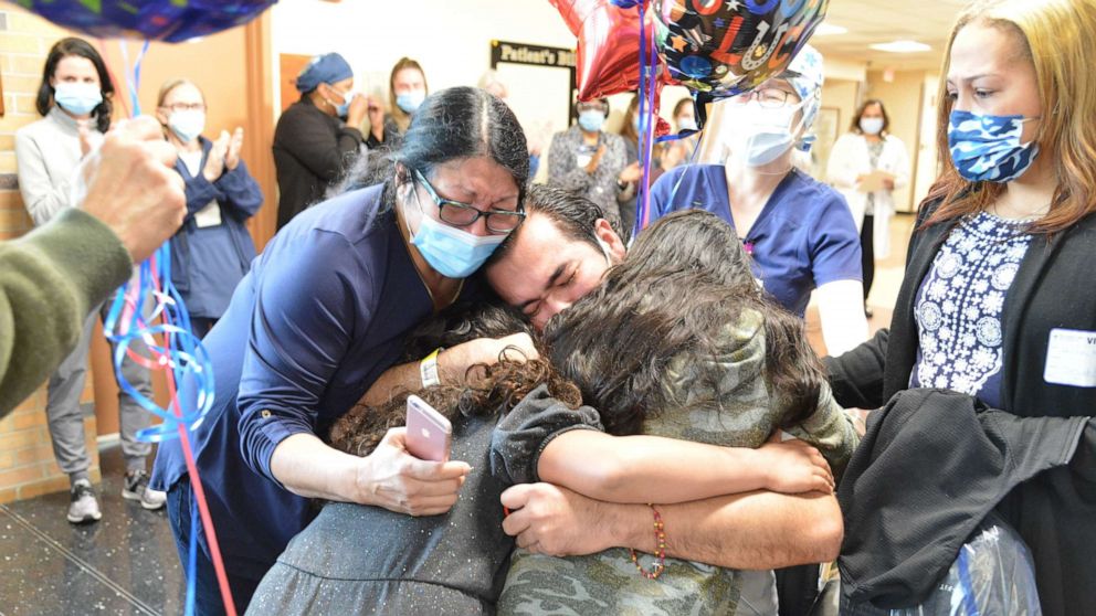 PHOTO: After 72 days at Catholic Health’s Mercy Hospital in Rockville Centre, New York, Alfredo Hercules, 39, was able to hug his daughters Isabel, 9 and Safiah, 7, after surviving COVID-19.