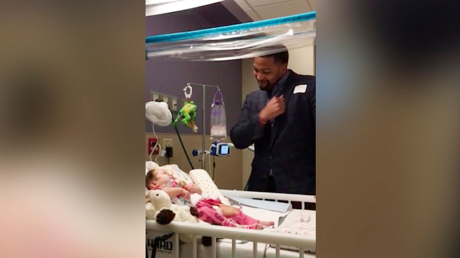 PHOTO: Josh Trimble stands with his daughter, Opal, at the Children's Center Rehabilitation Hospital.