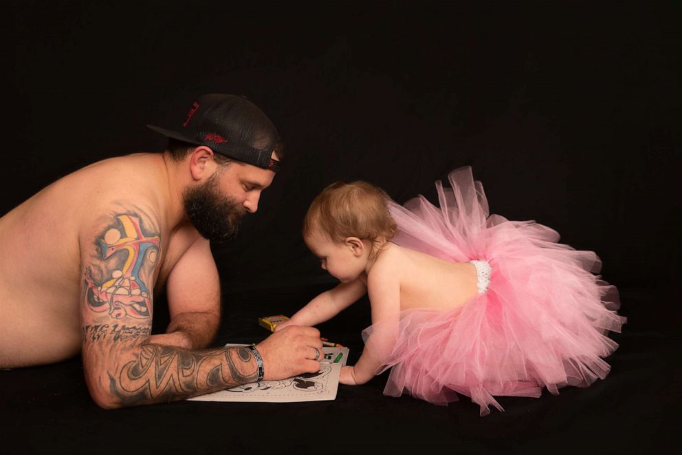 PHOTO: 
Casey Fields of Kilgore, Texas, and his daughter Lyla, 1, participated in the photo session shot by Jenn Floyd Photography. The photos were shared on Facebook by 50,000 people.
