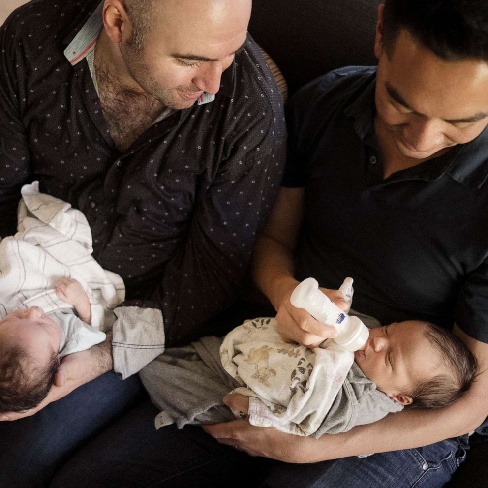 VIDEO: 2 dads welcome 2 babies born 9 days and hundreds of miles apart 