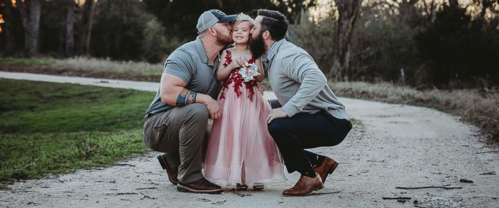 We Are The Adults Dad And Stepdad Pose With Daughter Before Father