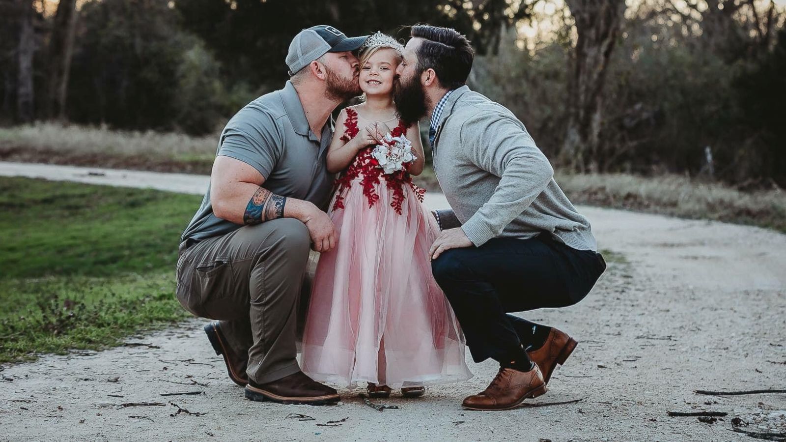 PHOTO: Dylan Lenox (left) is pictured with David Lewis (right) and their daughter Willow (center) before a daddy-daughter dance.