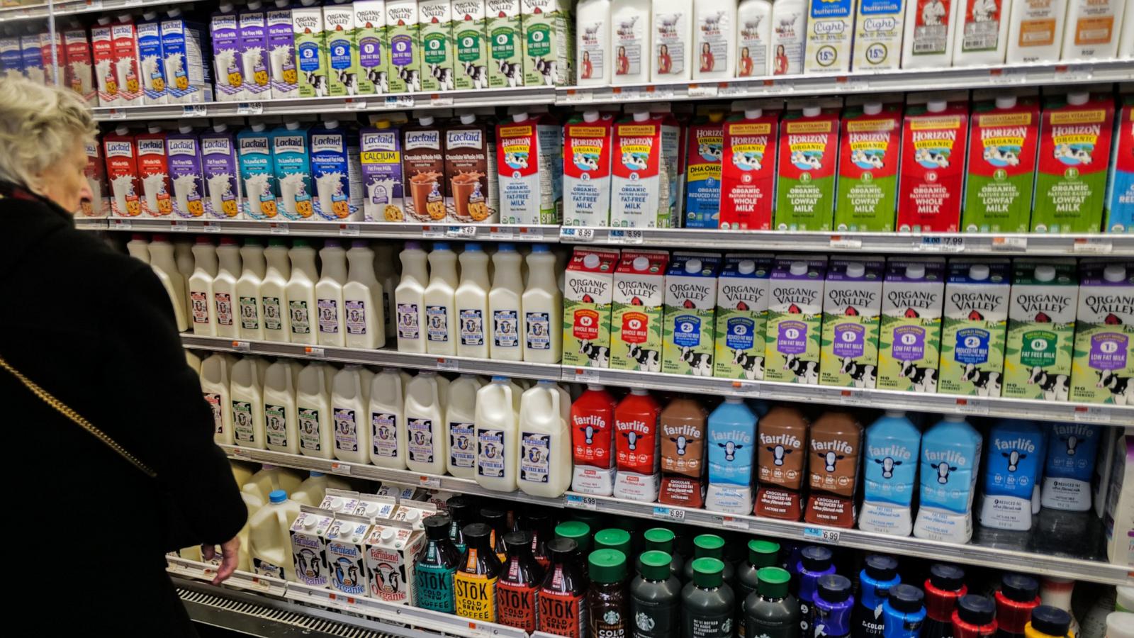 PHOTO: A woman shops in the dairy section of a supermarket in New York, Jan. 27, 2024.