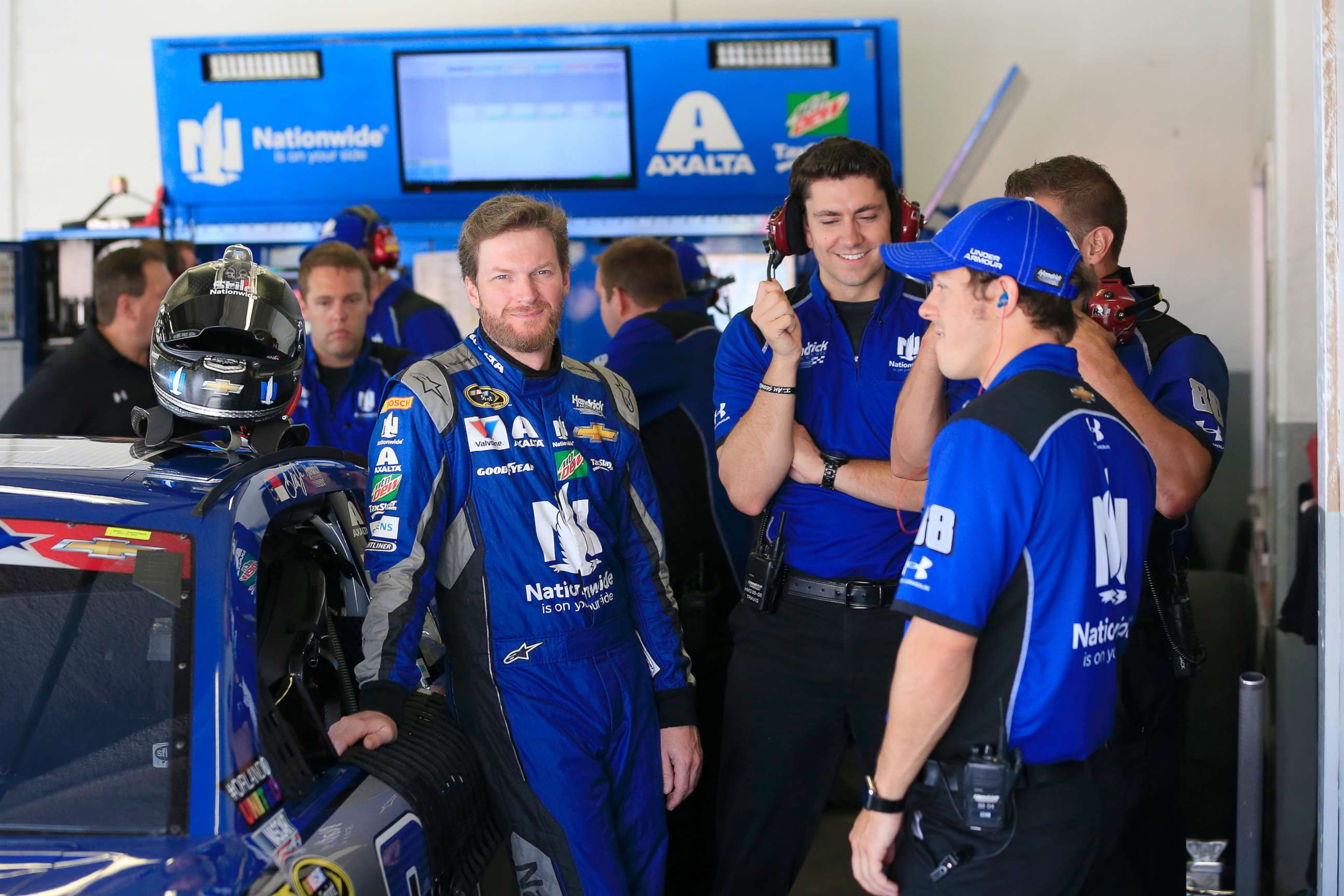 PHOTO: In this file photo, Dale Earnhardt Jr., driver of the #88 Nationwide Chevrolet, talks to his crew in the garage at Daytona International Speedway, July 1, 2016, in Daytona Beach, Fla.