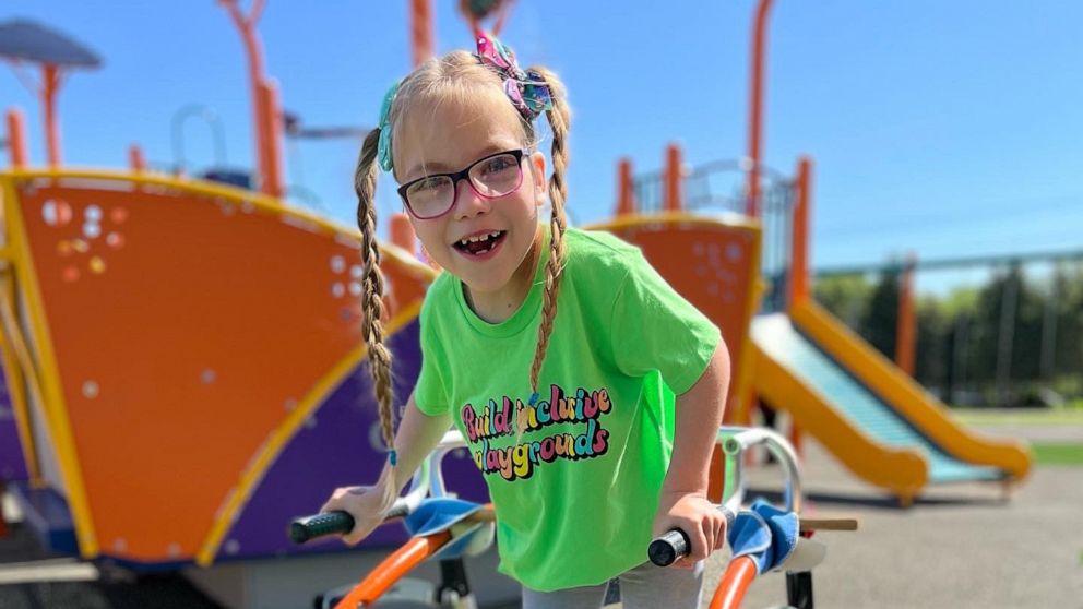 PHOTO: Dallas at an inclusive playground in Lake Zurich, Illinois in May. According to her mom, Dallas helped raise money at her therapy school to build the playground.