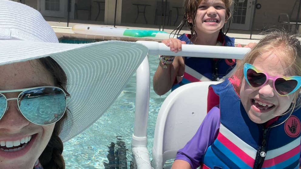 PHOTO: Dallas, her mom, Katrina Placzek, and sister Brooklyn enjoy an accessible swimming pool at Tiff's Place, an accessible vacation home in Florida.