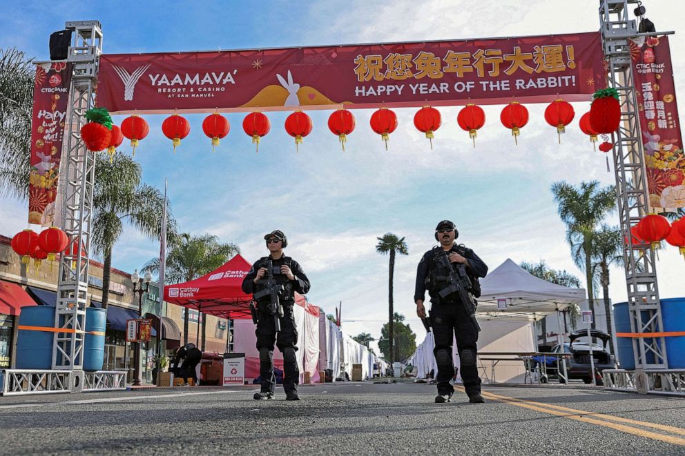 PHOTO: Police officers guard the area near the location of a shooting that took place during a Chinese Lunar New Year celebration, in Monterey Park, California, Jan. 22, 2023.
