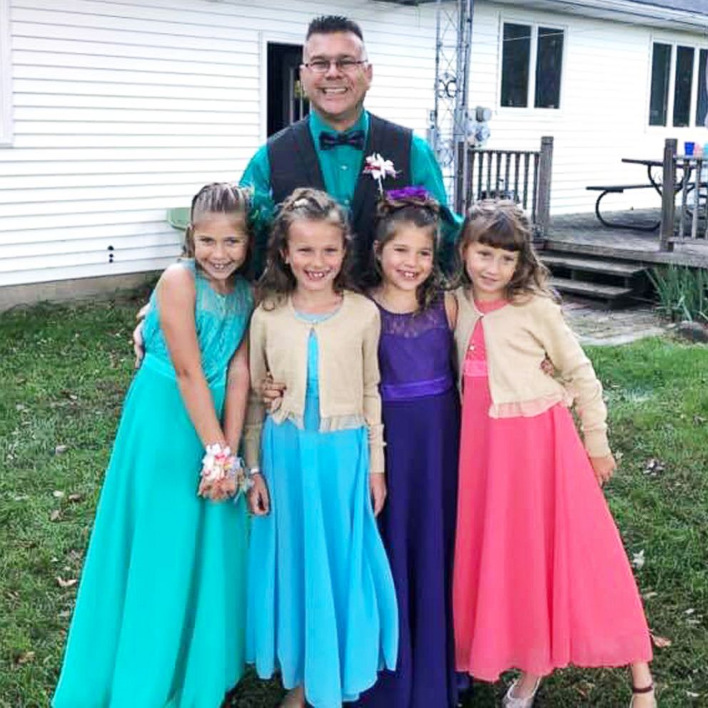 VIDEO: Teacher brings students to father-daughter dance after they lost their dad