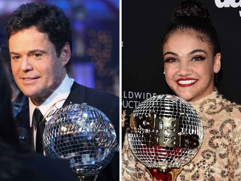 PHOTO: Donny Osmond and Laurie Hernandez pose with the Mirrorball trophy from "Dancing with the Stars" in a composite file image.