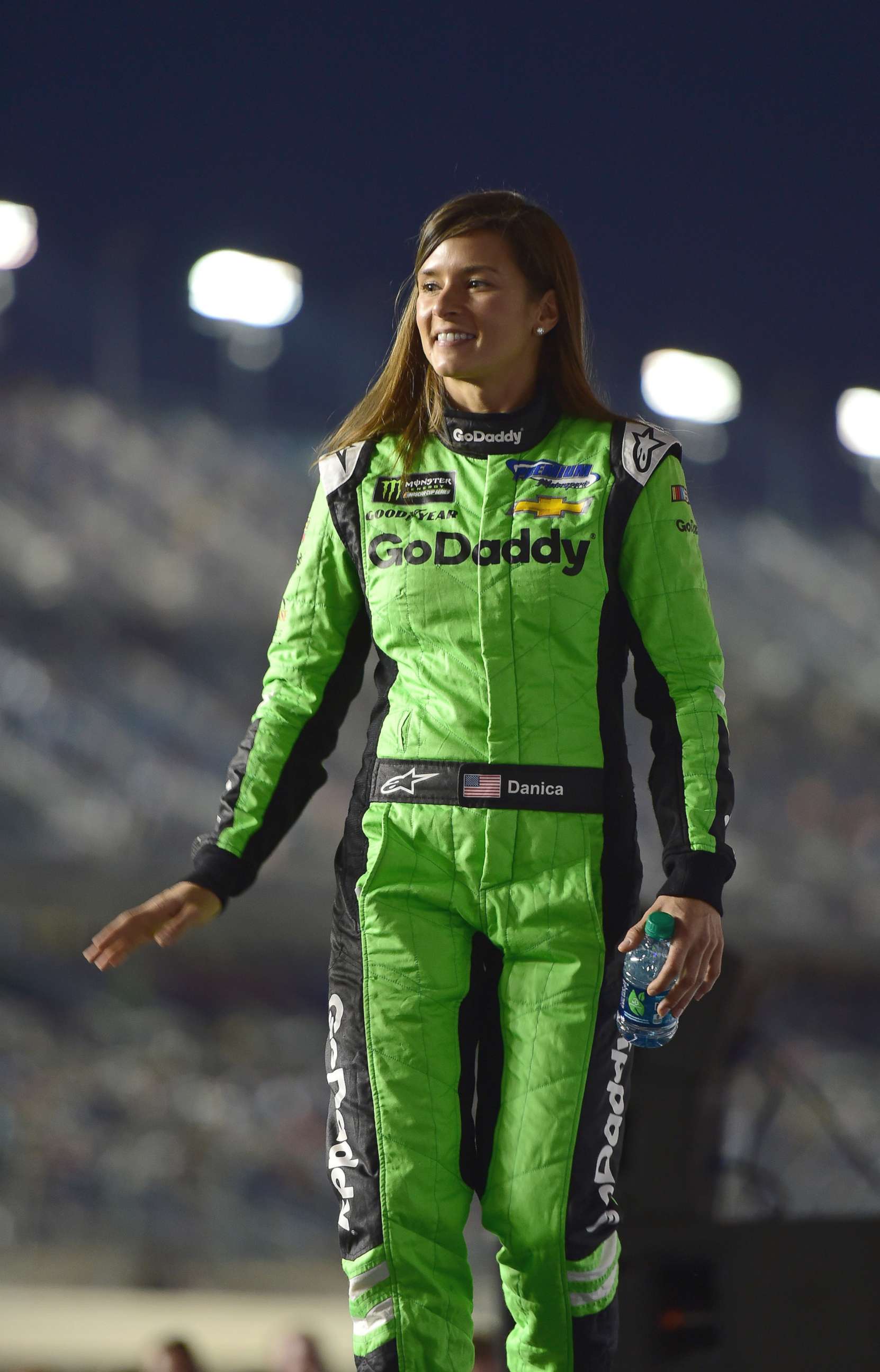 PHOTO: Danica Patrick crosses the stage during driver introductions prior to the start of the Monster Energy NASCAR Cup Series Can-Am Duel 1 at Daytona International Speedway, on Feb. 15, 2018 in Daytona Beach, Fla.